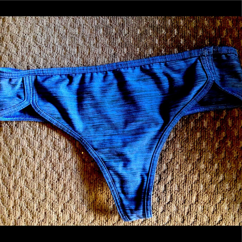 NWOT Victoria’s Secret Heather blue colored Thongs